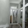 Cửa đi mở quay 1 cánh nhôm Xingfa màu trắng có vách cố định